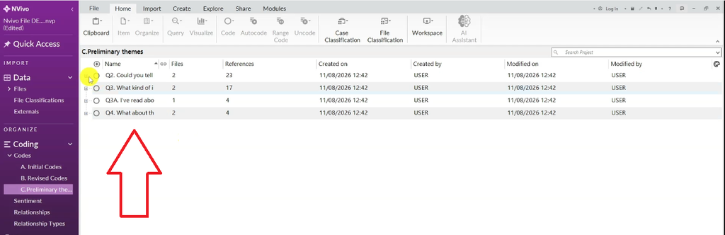 Screenshot of NVivo's Preliminary Themes folder listing four interview-question containers (Q2–Q4) with a red arrow pointing up at them.